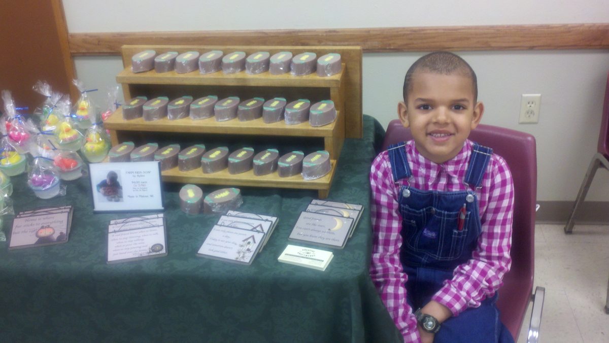 Ayden at six at his Farm Kids Soap table